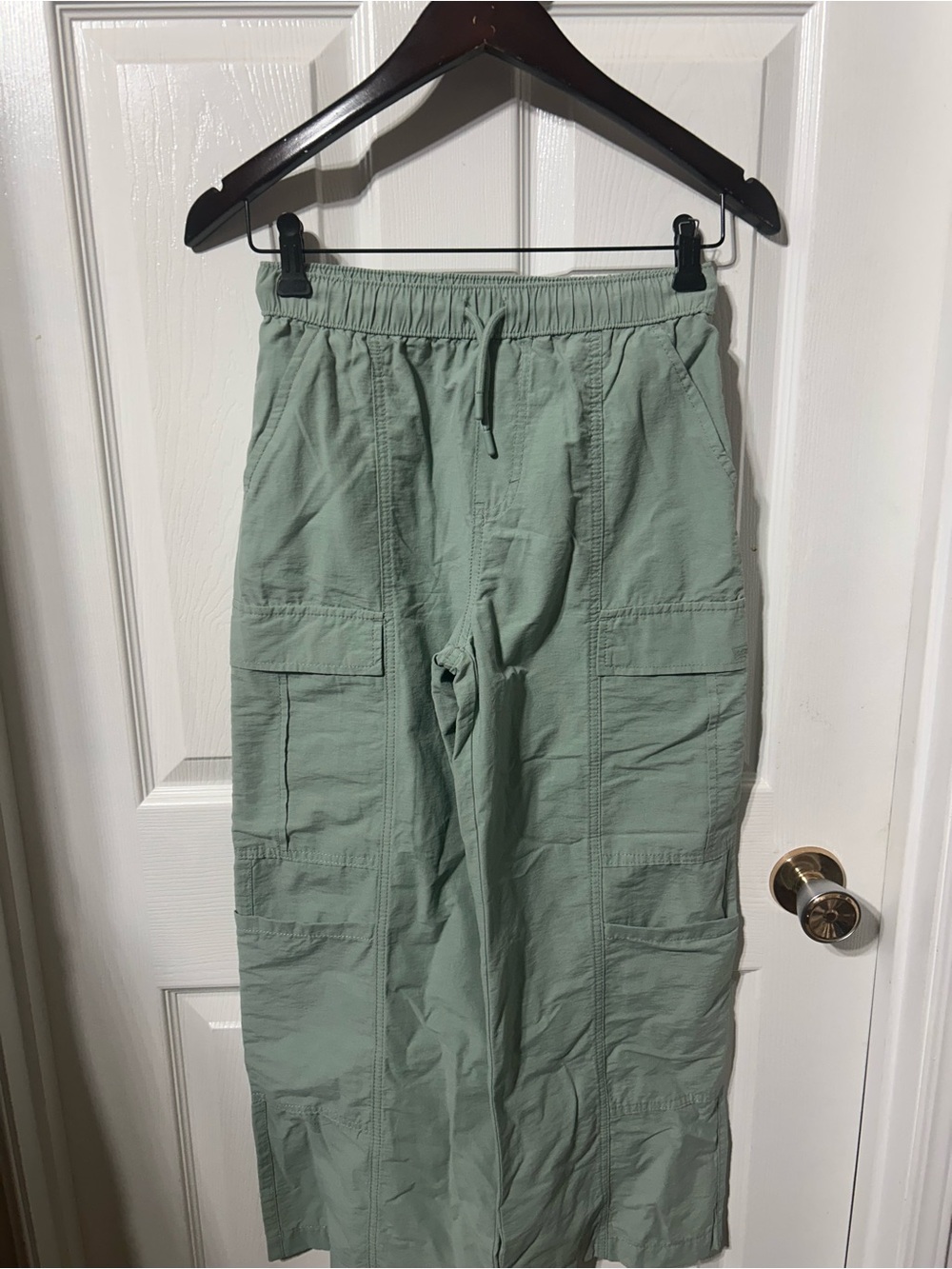 Levi's Sage Green Parachute Pants with Drawstring Waist and many pockets